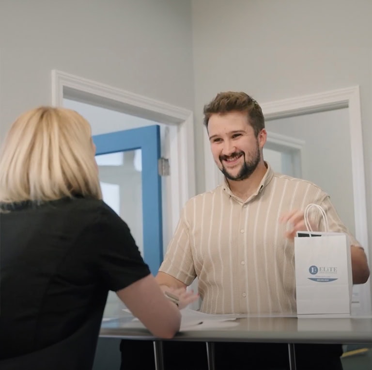 GentleWave Customer at the front desk of Elite Endodontics